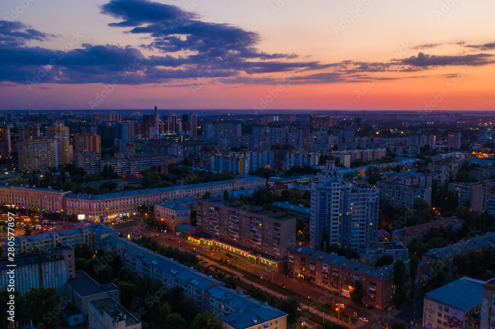 Night Voronezh city center after sunset, aerial panoramic view