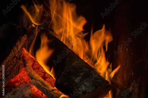 Fire and burning wood long exposure winter