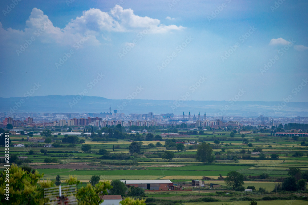 Fototapeta premium Landscape of Zaragoza city from the surroundings