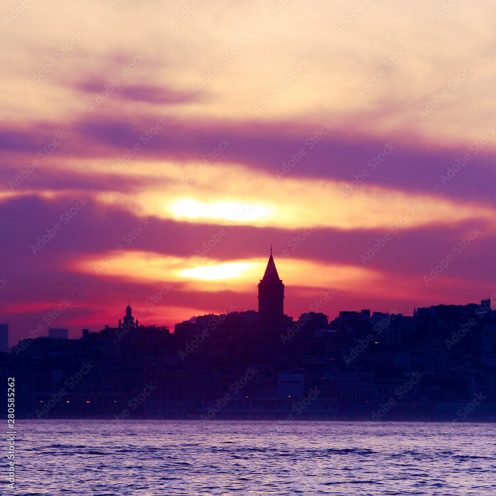 silhouette of galata tower image above evening in istanbul