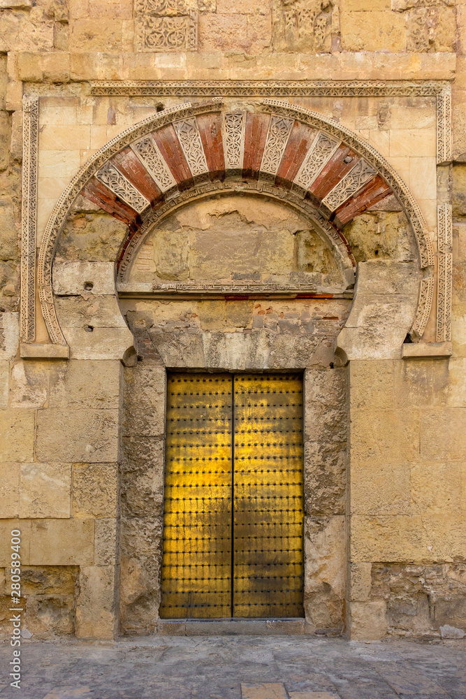 beautiful door with ornaments of a house in Andalusia Spain beautiful door with ornaments of a house in Andalusia Spain