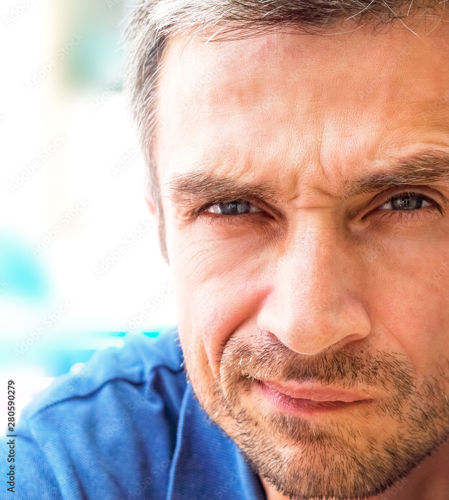 Disappointed male with discontent expression, frowns face, recieves bad news from interlocutor. Disappointed male with discontent expression, frowns face, recieves bad news from interlocutor.