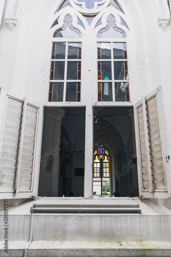 Lancet open window in St Andrew's Cathedral, Singapore. Gothic Revival architecture © sonatalitravel