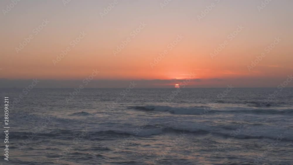 Beautiful sunset and sea waves. Relaxing atmosphere Beautiful sunset and sea waves. Relaxing atmosphere