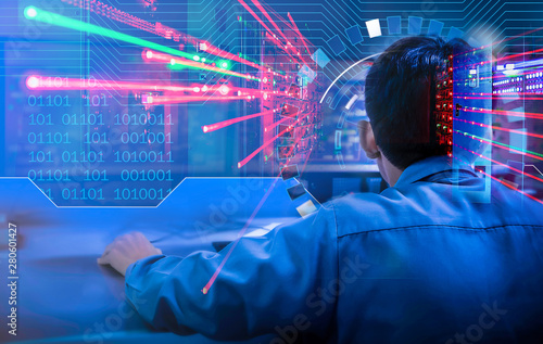 Double exposure Blurred light of man Engineering operations checking production process, Control room of a steam Turbine, Generators in the coal-fired power plant. Technology and industry concept