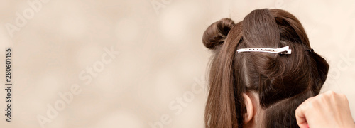 Hairdresser cuts a girl with long hair. Haircut on long hair. Hairstyle on long hair. Bride's morning. Visagiste prepares the girl for the holiday. Preparing for the holiday.	