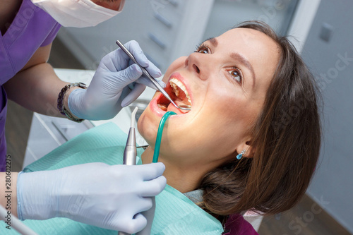 Examination oral cavity or treatment teeth  visiting dental office  blurred background