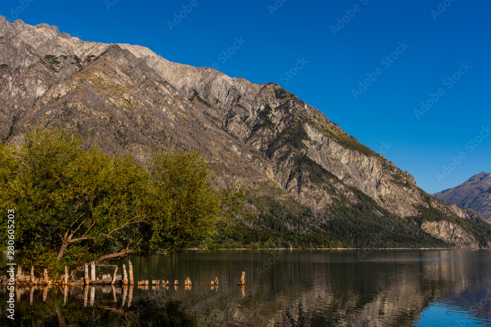 Lakeside view of calm Epuyen lake in Puerto Patriada, Patagonia, Argentina