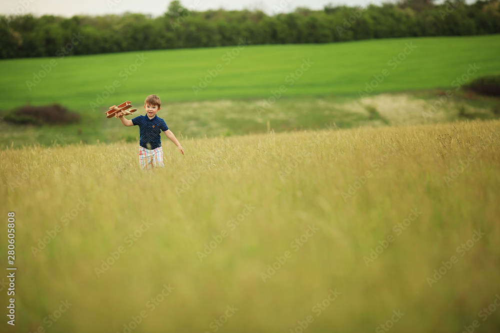 Boy with a wooden plane Boy with a wooden plane