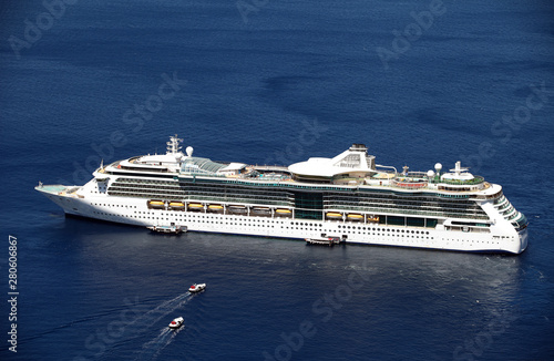 Cruise ship in the beautiful Greek island Santorini, Greece. © Cenk