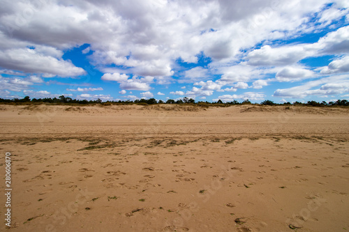 Dunes with Blue Sky and White Clouds