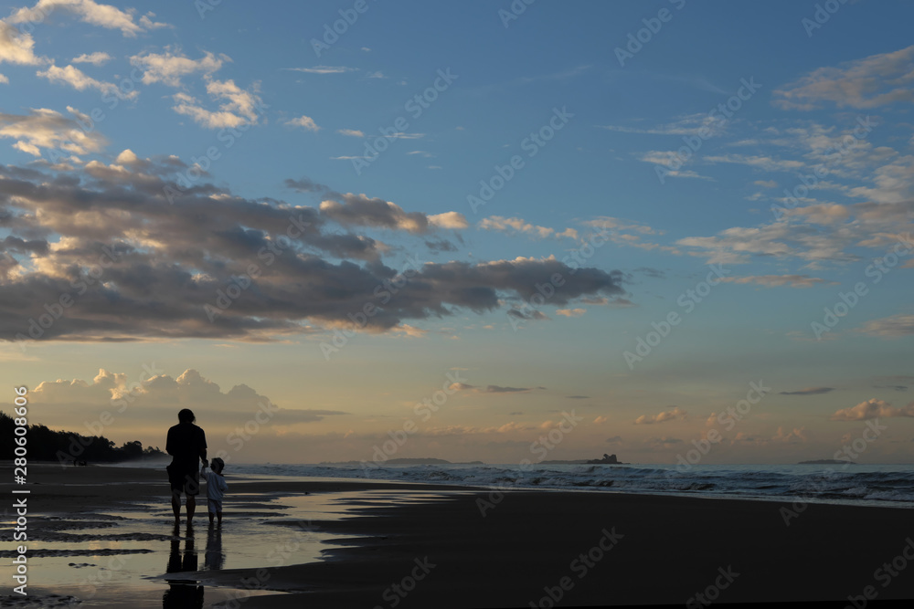 beautiful sunset beach with dramatic clouds and sky background