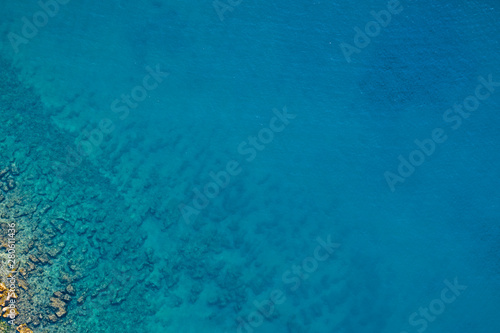 Aerial view of turquoise sea water. © magdal3na