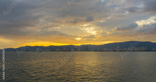Georgetown cityscape at sunset in Penang, Malaysia. © bennnn