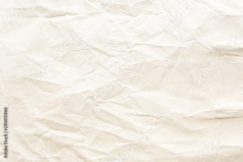 Old pale yellow crumpled paper background texture