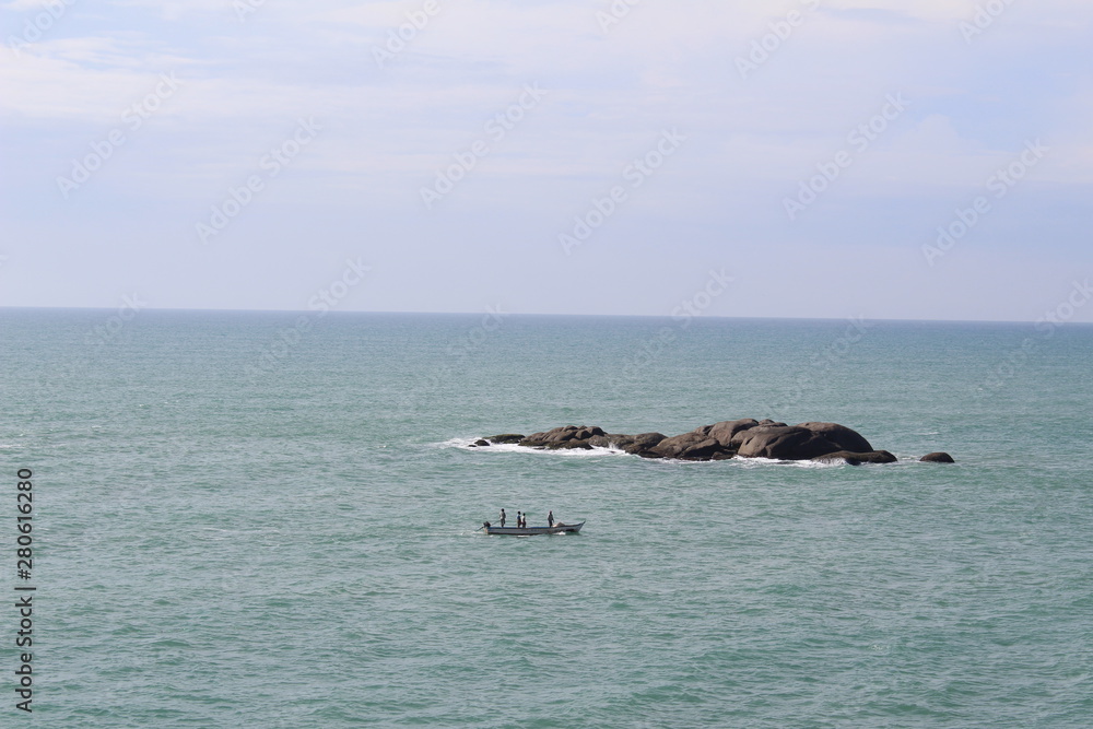 Fototapeta premium People Sea Rock