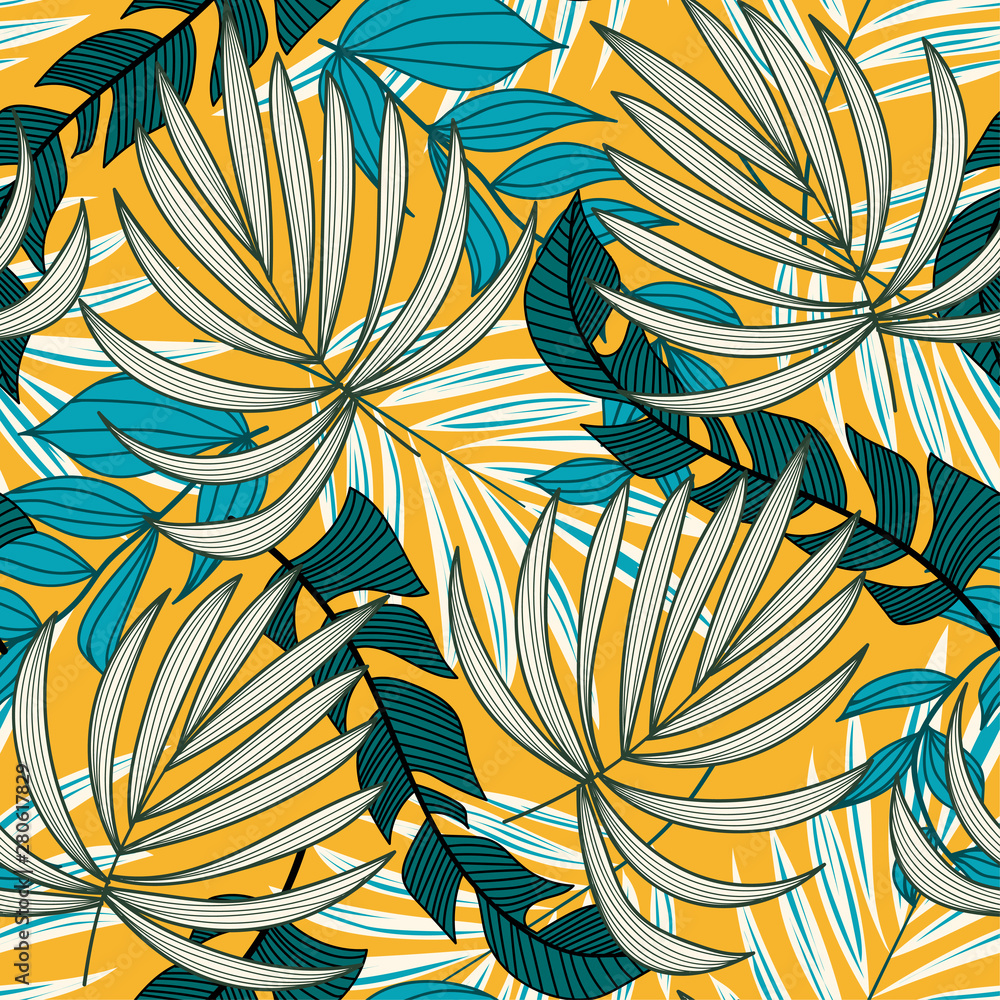 Summer trend seamless pattern with bright tropical leaves and plants on a yellow background. Vector design. Jungle print. Floral background. Printing and textiles. Exotic tropics. Summer design.
