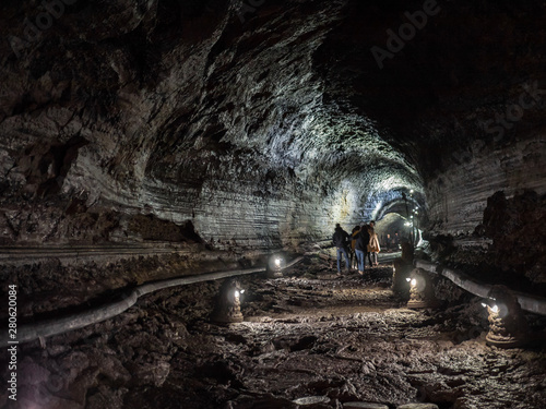The corridor inside the Manjanggul cave with lights to watch the flow of lava flows.  At Jeju Island, South Korea.