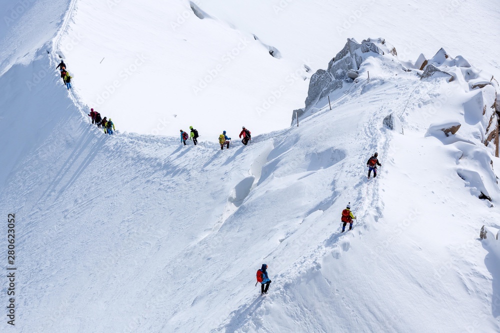 Group of climbers in snow on the way to Mount Blanc, Chamonix, France, Europe Group of climbers in snow on the way to Mount Blanc, Chamonix, France, Europe