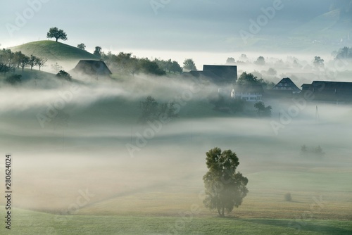 Autumn fog atmosphere in Swiss Plateau or Central Plateau, Hirzel, Canton of Zurich, Switzerland, Europe photo