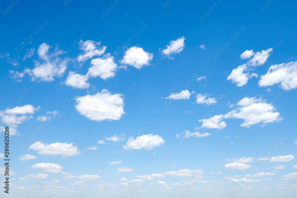 Bright beautiful blue sky with clouds for background or texture Bright beautiful blue sky with clouds for background or texture