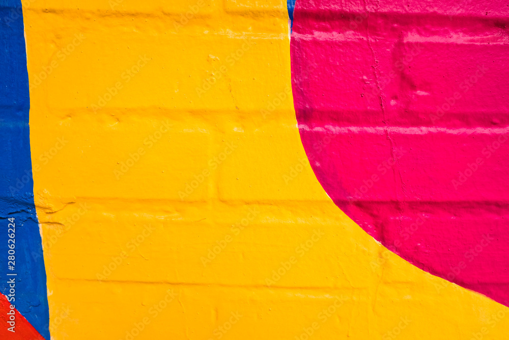 Naklejka premium Colorful pattern painted on a wall.