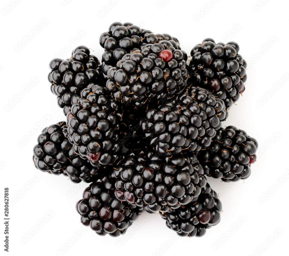 Pile of blackberries close-up on a white. The view of the top. Pile of blackberries close-up on a white. The view of the top.