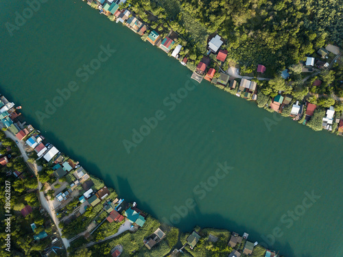 Floating restaurants and guesthouses located on the river bank