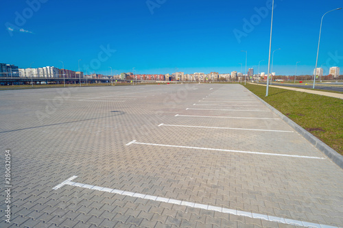 Open space with road signs and road markings  road intersections  pedestrian crossings  sunny day  blue sky  city landscape background