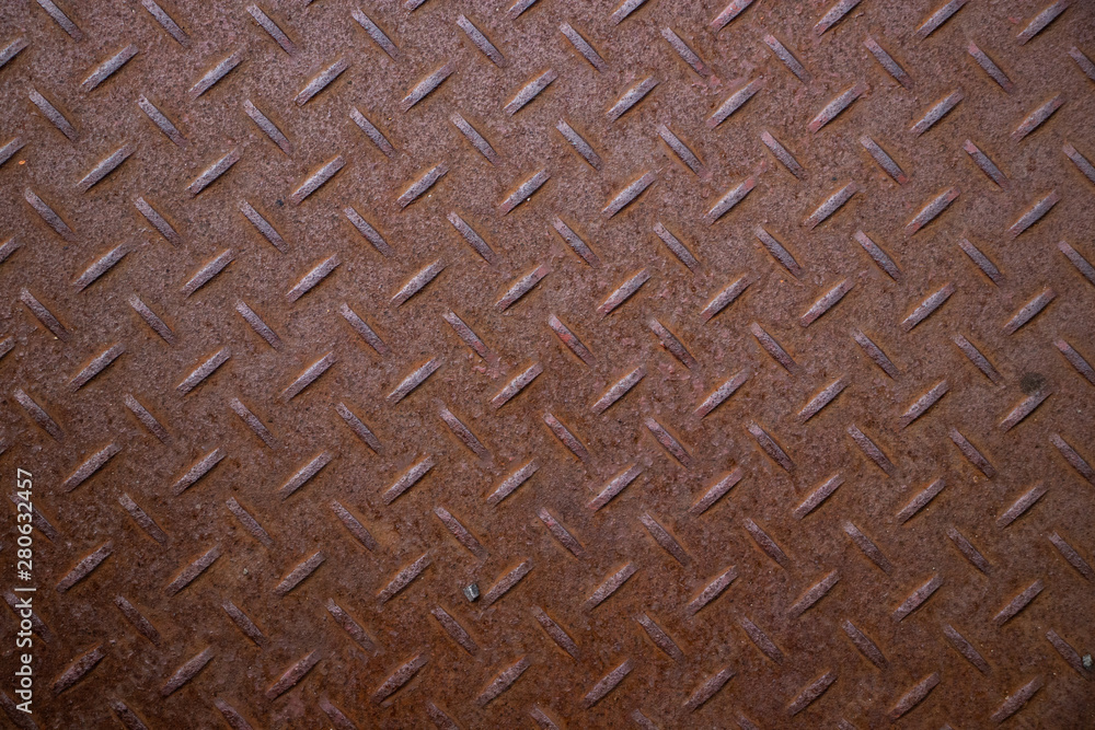 Rusty metal diamond grate texture background oxidization Rusty metal diamond grate texture background oxidization