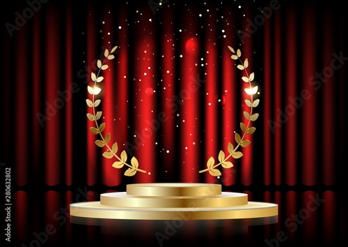 Golden laurel wreath over red round podium with steps in front of the curtains. photo