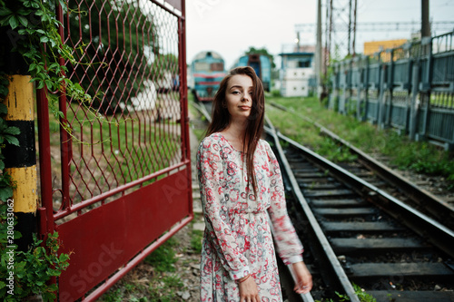 Lifestyle portrait of young girl posing on train station. © AS Photo Family