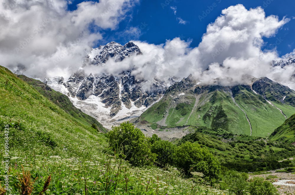 Obraz premium Georgia, Svaneti, Trek from Ushguli to Shkhara glacier. Beautiful view of valley, multi-colored ,Nature and travel.