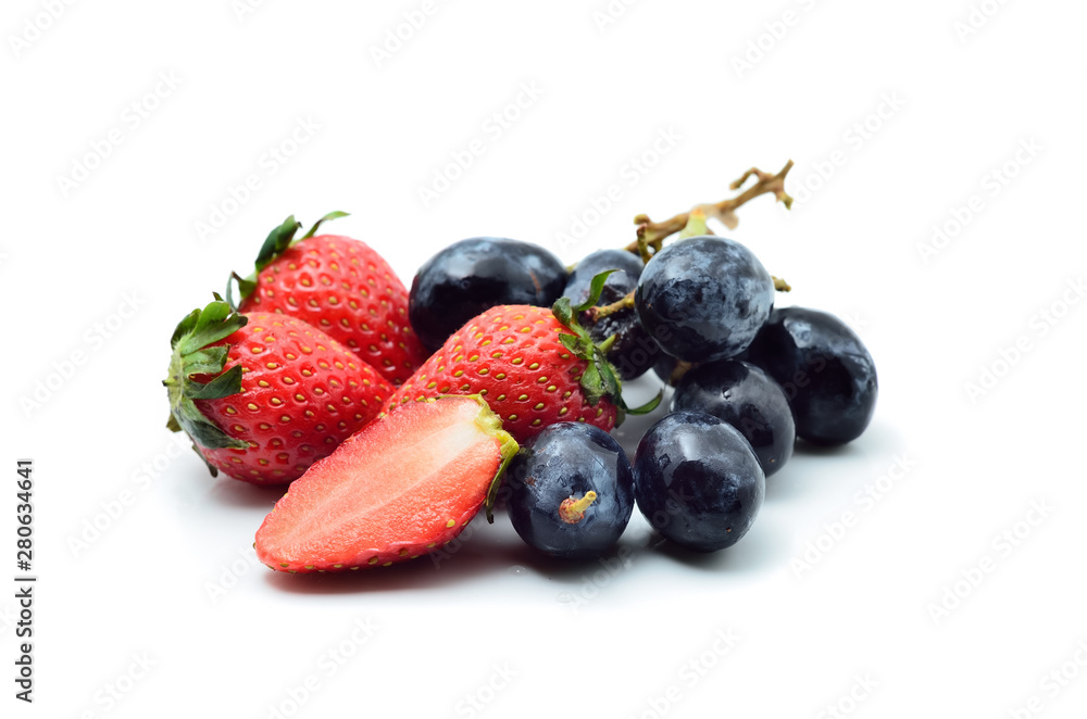Strawberries and grapes isolated on white Strawberries and grapes isolated on white