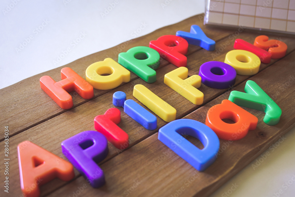 Fototapeta premium Happy April Fools Day Text with Colored Letters