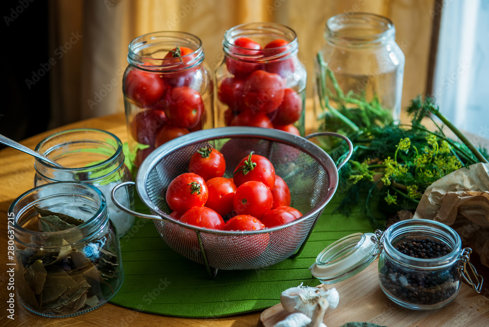 Fresh tomato and ingredients for conservation. Preparation marinated salted tomato Fresh tomato and ingredients for conservation. Preparation marinated salted tomato