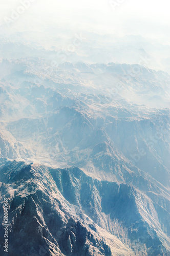 Fog between mountains range. Egyptian desert mountains. Aerial view.