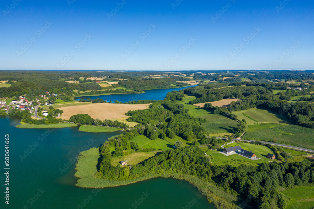 Aerial view of Kashubian Landscape Park. Kaszuby. Poland. Photo made by drone from above. Bird eye view.