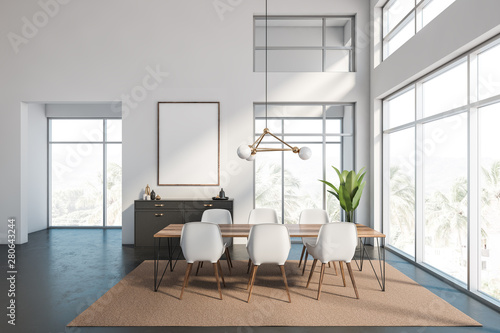 White dining room interior with poster
