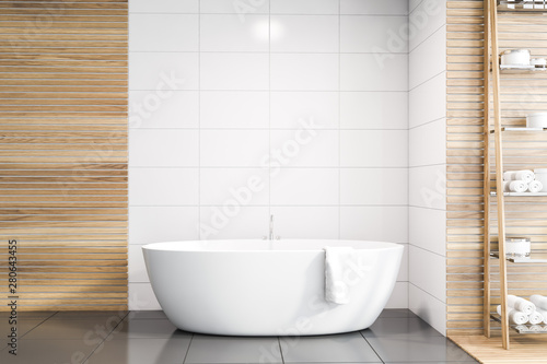 White tile and wood bathroom interior with tub