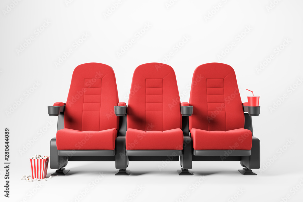 Obraz premium Three red cinema chairs on white background