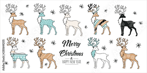 Fototapeta Naklejka Na Ścianę i Meble -  Set of hand drawn christmas  reindeer . Decoration isolated elements. Doodles and sketches vector illustration