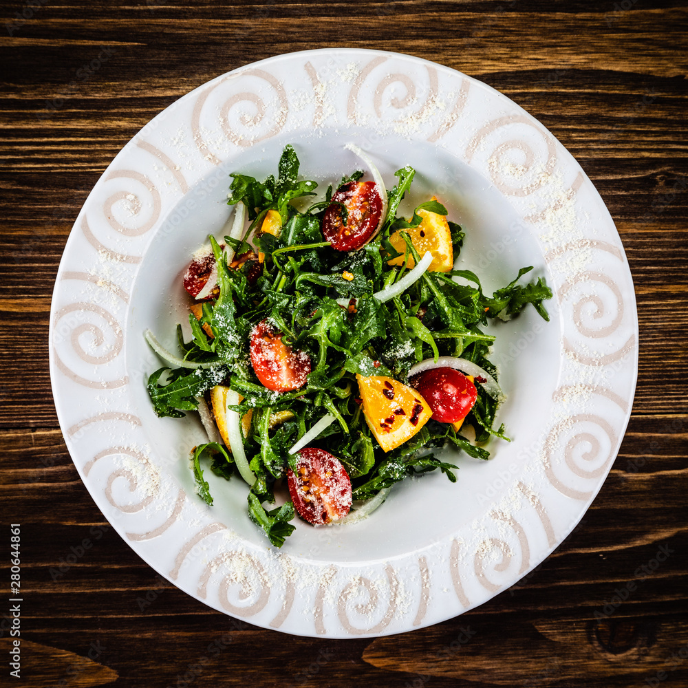 Greek salad on wooden background Greek salad on wooden background
