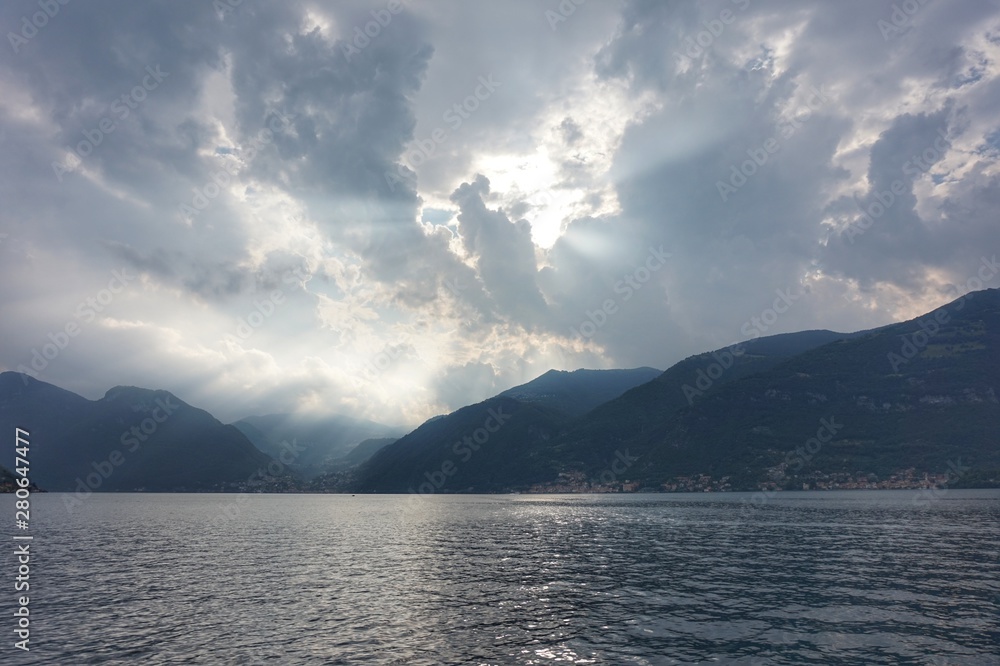 Lake Como in the rays of the setting sun. Lake Como in the rays of the setting sun.