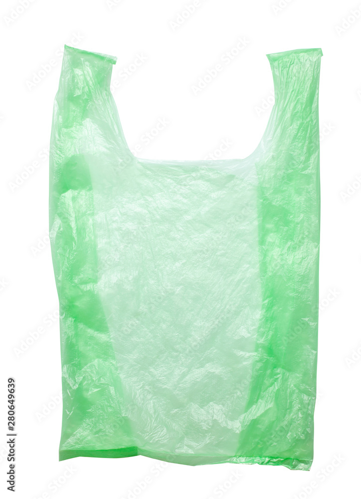 Green plastic bags isolated against a white background. Environmental pollution by disposable bags, recycling Green plastic bags isolated against a white background. Environmental pollution by disposable bags, recycling