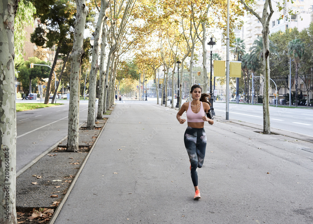 Runner in city. Runner in city.