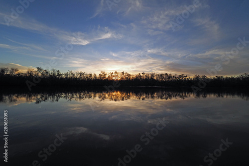 Sunset on Coot Bay Pond in Everglades National Park, Florida on a calm winter evening.