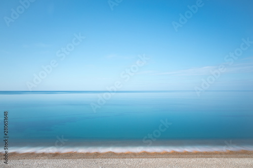 Calm blue sea and shoreline