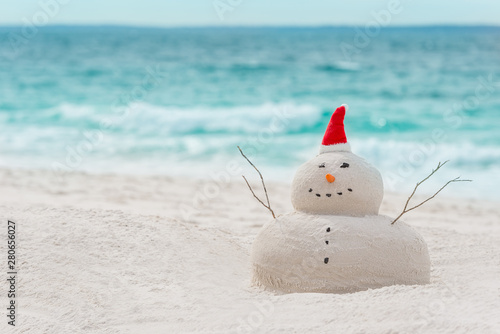 Canvas Print Australian Christmas Sandman on a beautiful white sand beach