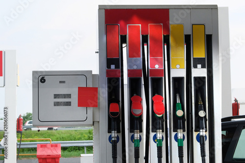 Petrol station pump. Gas station and petroling concept. To fill car with fuel. Gasoline, oil and diesel products.